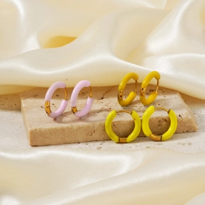 Chic enamel geometric hoop earrings in pink and yellow finish on premium stone stand