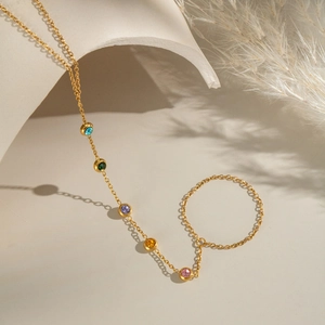 18K gold plated stainless steel hand chain featuring five colorful round-cut gemstones