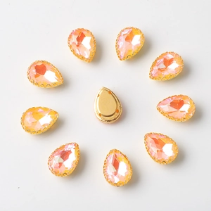 Orange teardrop rhinestones with gold base settings for DIY jewelry and hair accessories