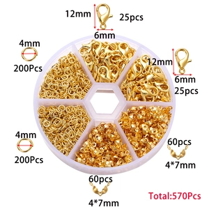 Detail view of 570pcs gold DIY jewelry tool kit with lobster clasps and jump rings in a box