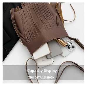 Detailed macro view showing interior capacity and brown lychee grain leather texture