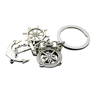 Antique silver nautical keychain set featuring anchor, rudder, and compass charms