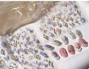Detail of self-adhesive nail stickers with purple tulips, butterflies and love text