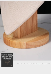 Detail of necklace display stand with solid beech wood base and soft velvet neck form