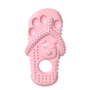 Pink slipper shaped dog chew toy with bear pattern and durable silicone texture