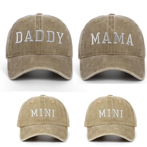Detail of embroidered Daddy Mama and Mini texts on washed cotton family baseball caps