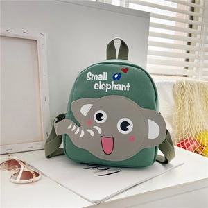 Detail of green canvas toddler backpack featuring a cute gray elephant and text