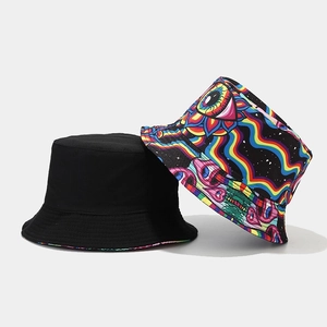 Reversible bucket hat featuring solid black and colorful psychedelic mushroom prints