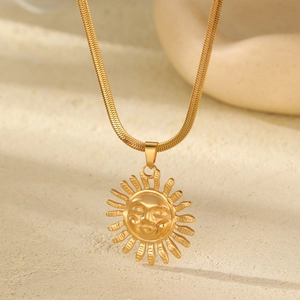 Vintage gold plated sun face pendant necklace with a sleek flat snake chain for women