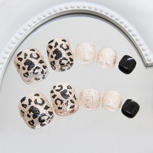 Champagne leopard print and glitter press-on toenails in black and gold glossy finish