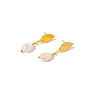 Elegant gold leaf earrings with natural baroque pearls on a clean white background