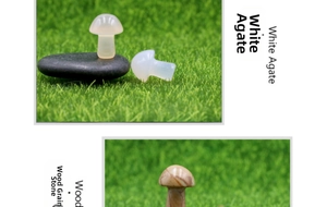 Macro detail of white agate and wood grain stone mini mushrooms for bonsai decor