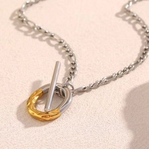 Collier chic bicolore or et argent avec fermoir OT et élégante chaîne gourmette