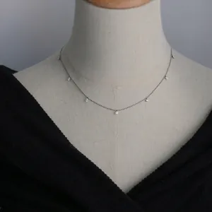 Sparkling silver stainless steel beaded necklace with multiple star-shaped cubic zirconia