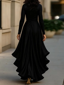 Elegant black long-sleeved satin maxi dress with a flowing skirt back view in street setting