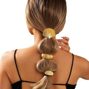 Three-piece gold metal hair tie set including shell-shaped and textured ring designs