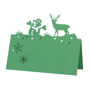 Laser cut green Christmas place card featuring reindeer and snowman silhouettes