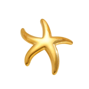 Macro shot of a high-quality golden starfish pendant with polished metallic luster finish