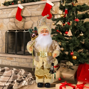 Standing Santa Claus doll in gold robes with lantern and gift bag for Christmas decor