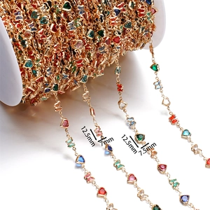 Macro view of colorful copper heart and butterfly chain links with specific dimensions
