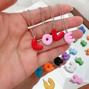 Fashion enamel letter pendant necklaces, colorful DIY alphabet charm jewelry accessories.