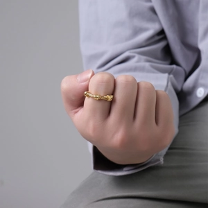 Industrial style gold twisted wire knot ring made of durable stainless steel for women