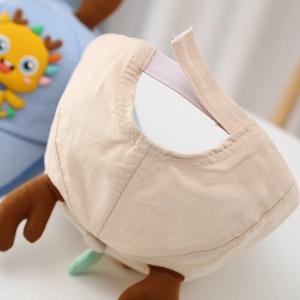 Detail of adjustable velcro strap and fabric stitching on blue toddler baseball cap