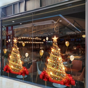 Golden Christmas tree window stickers with Merry Christmas balloons and gift boxes