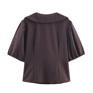 Deep coffee short sleeve shirt with navy collar and lace embroidery details in back view
