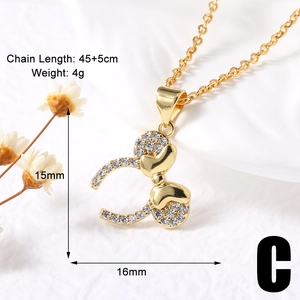 Macro view of gold Mickey mouse pendant with crystals and 45cm chain length specs