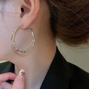 Chic double-layer bamboo textured silver hoops for women in minimalist style