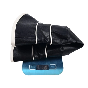 Black PU leather bucket hat with white trim and pebbled texture on scale