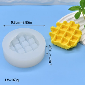 Detail view of round silicone waffle mold with dimensions of 9.8cm diameter and 2.8cm height