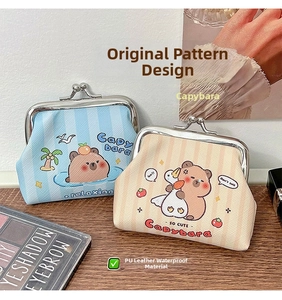 Detailed view of waterproof PU leather Capybara coin purses in blue and beige striped patterns