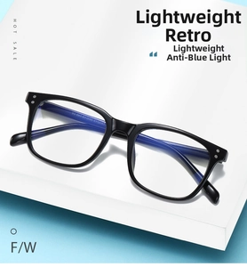 Detailed view of lightweight TR90 black frames with blue light blocking lenses and rivets