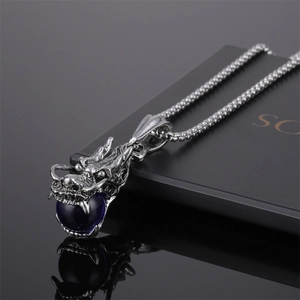 Collier hip hop en acier titane avec pendentif tête de dragon argenté et perle bleue