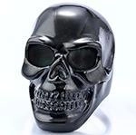 Gothic punk skull ring in matte gun black stainless steel on a clean white background