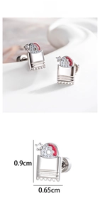 Macro detail of silver geometric cartilage stud with red enamel and zircon 0.9cm size