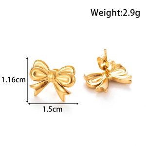 Golden titanium steel bow stud earrings with push-back closure on white background