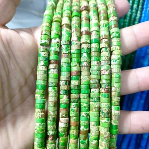 Close-up of turquoise spacer beads with natural brown veins for DIY jewelry making