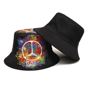 Retro graffiti bucket hat with peace and love print and reversible black canvas design