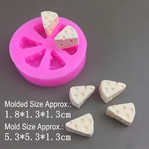 Macro view of silicone cheese mold with small DIY resin triangle cheesecake crafts