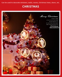Detail of warm white LED Christmas window lights with laser engraved festive patterns
