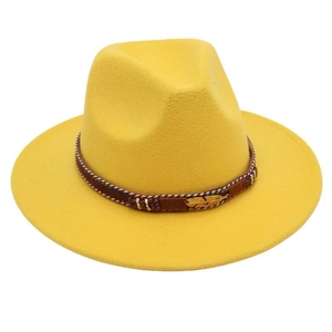 Detail of yellow wool felt fedora with braided band and golden feather charms
