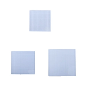 Three-piece set of translucent silicone chess board molds with a square grid design