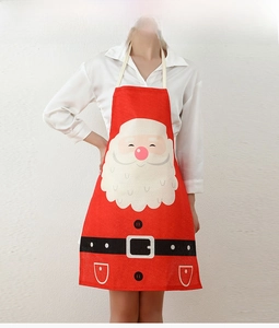 Detail of red Santa Claus apron with white beard print and hanging neck strap design