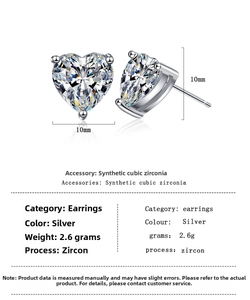 Detailed view of 10mm heart stud earrings with cubic zirconia in white gold finish
