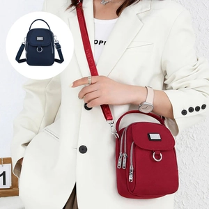 Red waterproof oxford cloth crossbody bag with multiple zipper pockets for women