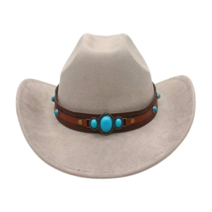 Detail of western cowboy hat with turquoise beads and brass studs on leather band