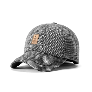Winter thermal baseball cap in grey tweed with a vintage leather patch and ear flaps